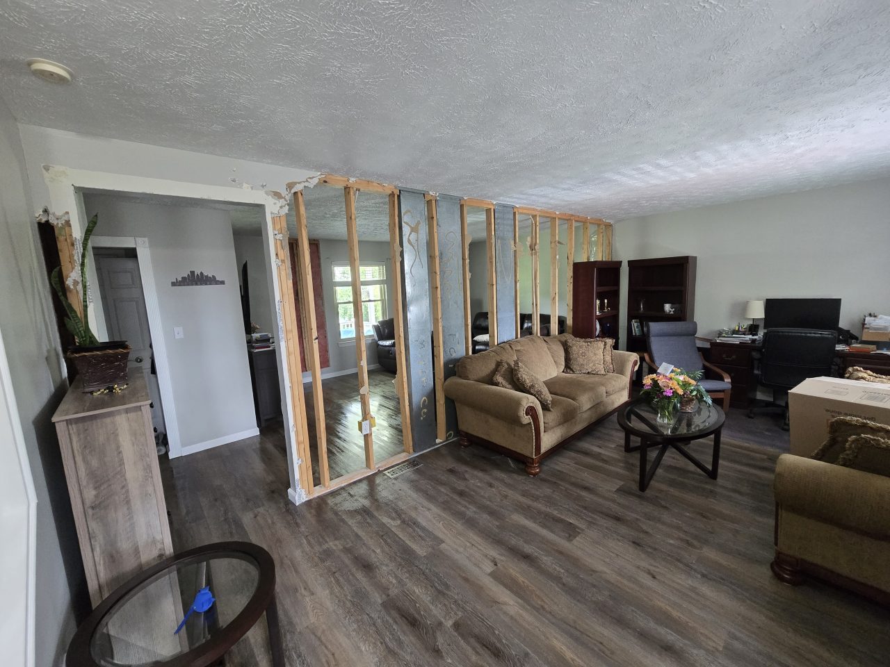 Picture of living room before wall removal